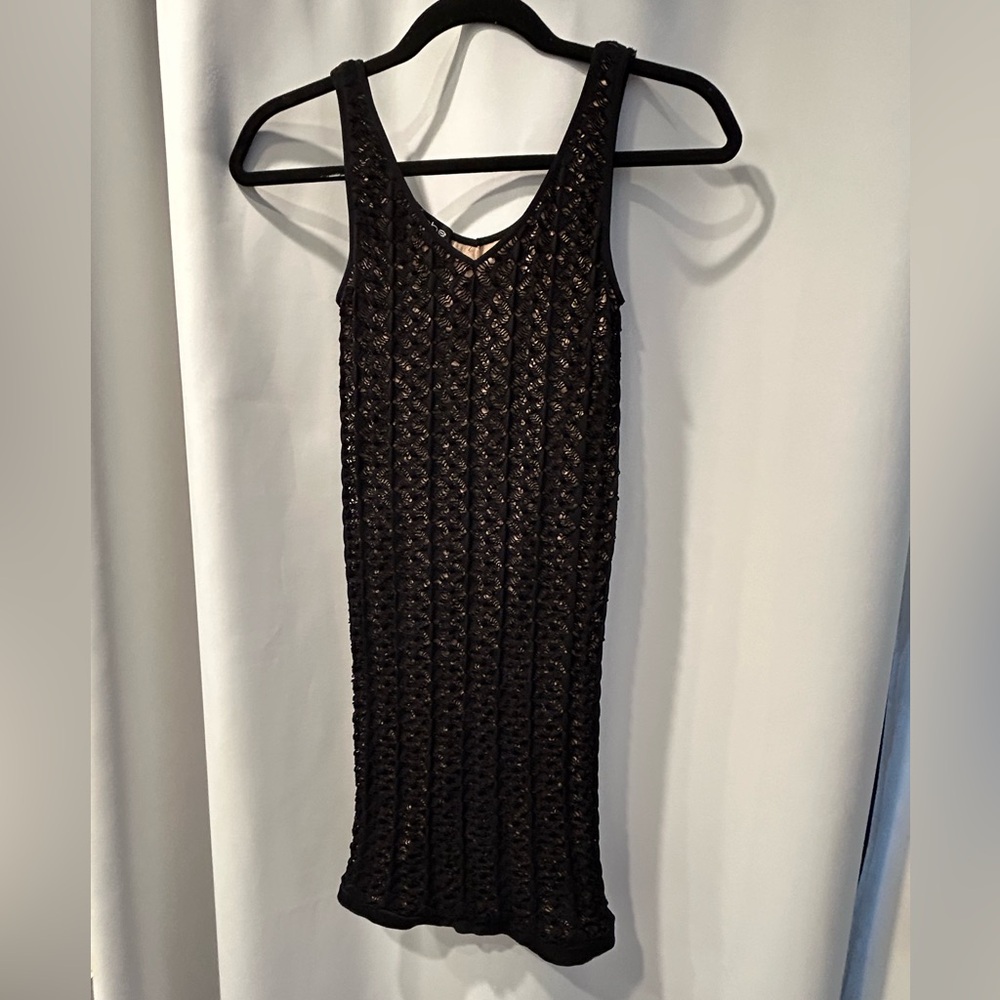 Bebe knit firm fitting dress.